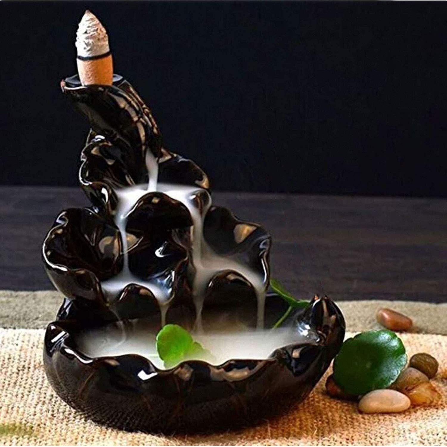 This ceramic incense burner that dispenses smoke like a fountain
