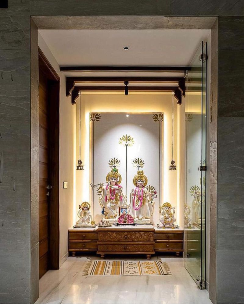 Pooja Room with stylish lighting by Revati Interior