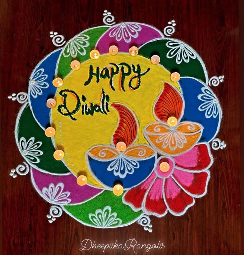 Rangoli Design with Multiple Diyas and Patterns 